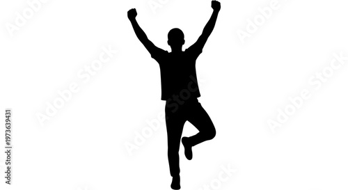 Silhouette of a triumphant man jumping.