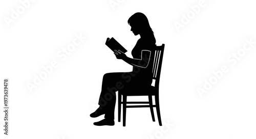 Silhouette of a woman sitting on a chair and reading a book.