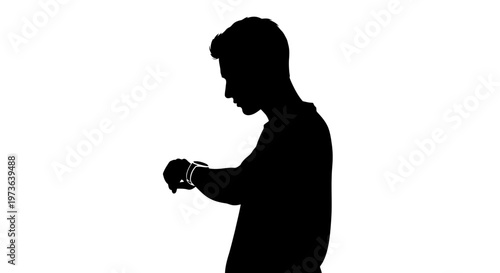 Silhouette of a young man checking his wristwatch symbolizing time management and punctuality.