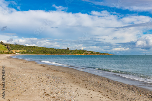 Coastal beach landscape with Carbonera lighthouse on Punta Mala, La Alcaidesa, Spain.