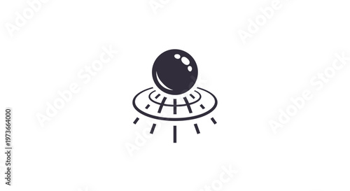 Black bowling ball on a rack.