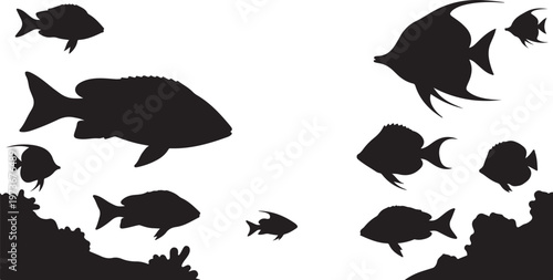 School of fish swimming in the ocean water silhouettes