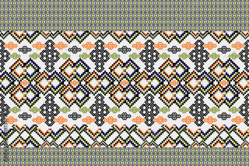 Seamless ethnic geometric pattern with repeating diamond and decorative motifs in vibrant colors. Symmetrical ornamental design ideal for textile, fabric, wallpaper, and surface patterns.