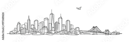 City skyline with bird flying over waterfront and bridge