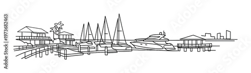 Yachts and sailboats docked at marina with waterfront buildings