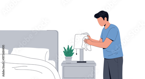 Man cleaning bedside lamp in bedroom, home hygiene and tidiness concept
