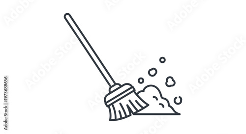 a broom sweeping dust representing cleaning and essential housework ideal for concepts of tidiness