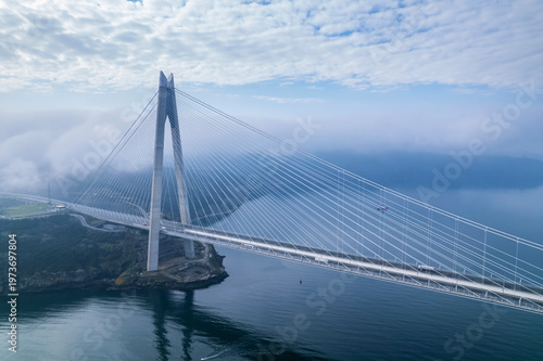 Yavuz Sultan Selim Bridge in Istanbul, Turkey. 3rd bridge of Istanbul Bosphorus. Foggy weather.