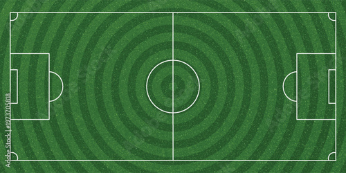 Top-down aerial view of a green soccer field with white markings, including the center circle, penalty areas, and goals.