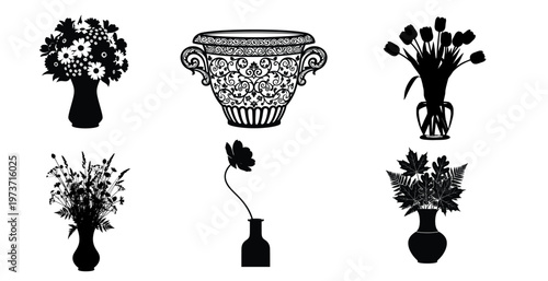 Black and white floral arrangements in decorative vases still life