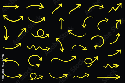 Collection of vibrant yellow arrows in various shapes and directions on a dark black background