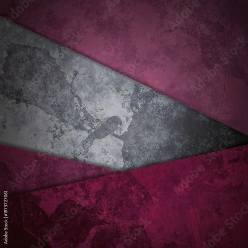 a red and black triangle lying on rough ground, its sharp edges contrasting with the textured, neutral surface