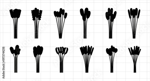 Collection of black flower silhouettes on grid background various shapes and sizes graphic design elements