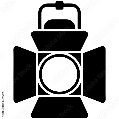 Theatrical spotlight mounted on a ceiling support bracket