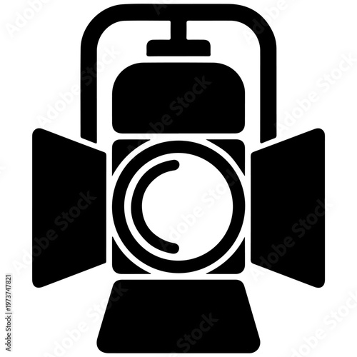 A classic stage spotlight with adjustable lens and reflector for theatrical lighting