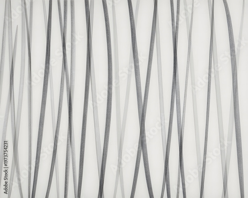 A black and white cable and metal wire design forms a textured line pattern against a light grey steel backdrop for a modern industrial wallpaper art
