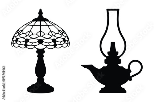 Silhouette of a tiffany style lamp and an old oil lamp