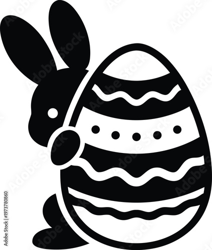 Easter bunny peeking from egg silhouette vector illustration