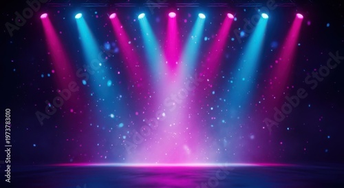 A stage with pink and blue lights shining down