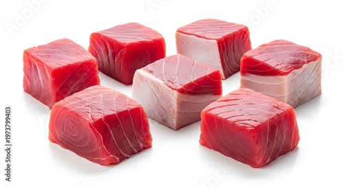 Raw tuna steaks cut into cubes on white background fresh seafood for sushi or sashimi