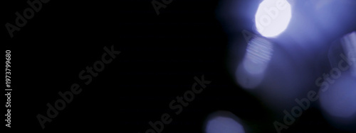 Wallpaper Mural Dark black background with blue soft light leak effect for cinematic overlay texture. Torontodigital.ca