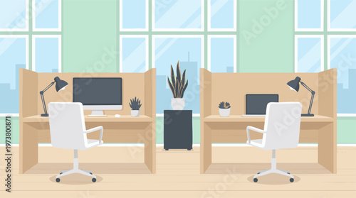 Modern office workspace with two cubicles, computers, and green plants