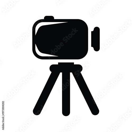 A video camera mounted on a tripod for steady filming and recording purposes