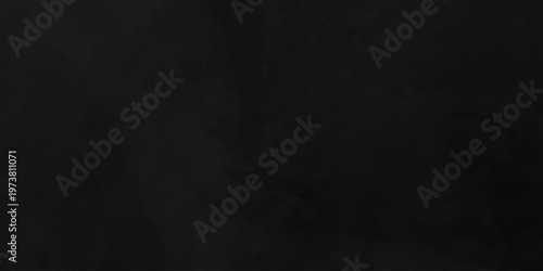 Distressed rough black cracked wall slate texture wall grunge backdrop smoke background. Stone concrete texture anthracite panorama. Old vintage charcoal night dark black stucco design.