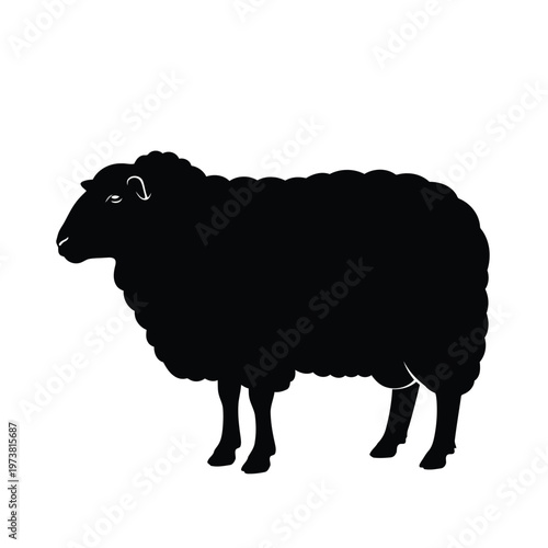 A black silhouette of a sheep stands alone in a field at daytime