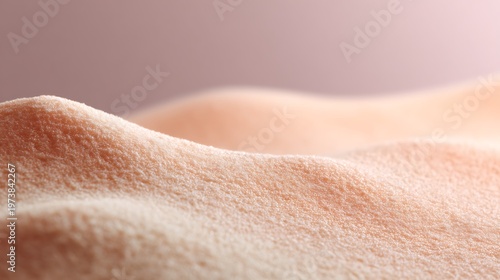 A close-up view of textured skin showing the fine details and subtle contours, it gives a sense of touch and surface