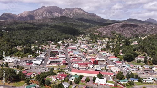 CBD of Queenstown mining town in West Coast mountains of Tasmania – aerial view.