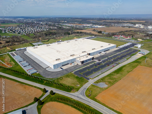 Aerial view of a large modern industrial warehouse and distribution center