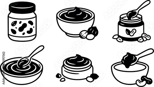Nut butter jars bowls and spoons with nuts