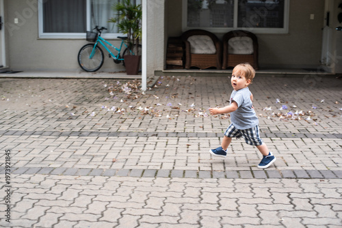 Child running inside a residential housing complex