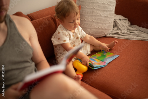 Father and son reading books