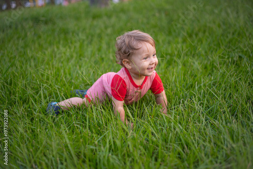 Happy baby on the grass