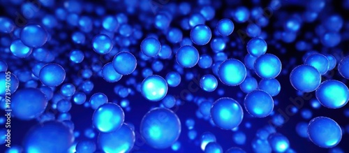Luminous spheres of electric blue light float through a mesmerizing and deep cinematic void.
