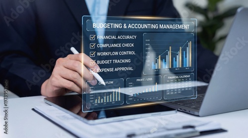 A businessman using a laptop for budgeting and accounting management
