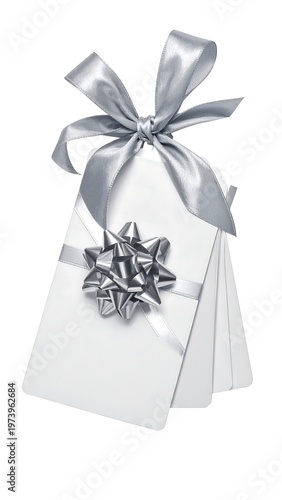 A white gift card with a silver ribbon and bow