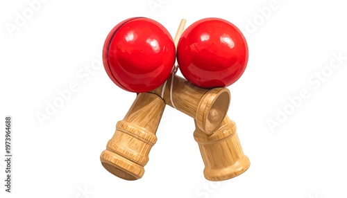 A wooden toy with two red balls connected by a string