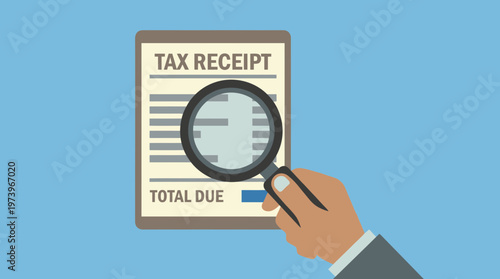 Magnifying Glass Examining Tax Receipt