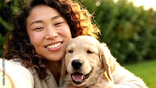 Woman Hugging Golden Retriever Dog.