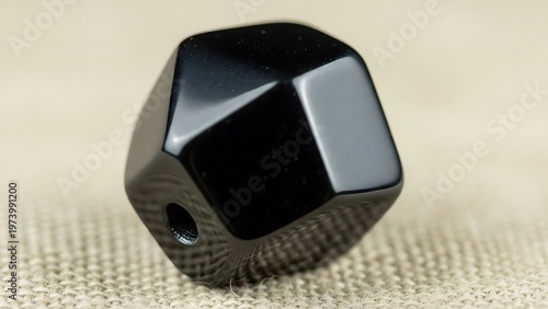 Elegant black obsidian bead, artfully crafted gem for jewelry making projects