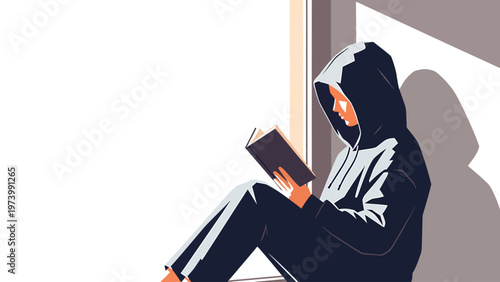 Person in hoodie reading book by sunlit window, quiet moment of solitude and focus with strong shadows