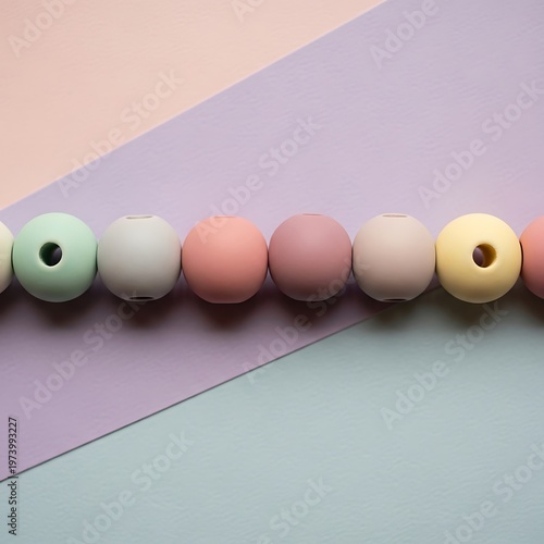 Pastel Palette Spheres Arranged Diagonally Over Multicolored Geometric Shape