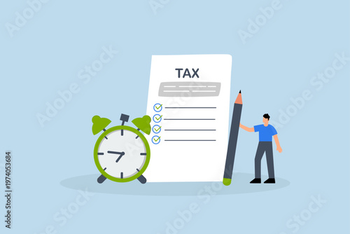 Tax time reminder, businessman grasping pencil alongside tax paperwork and clock