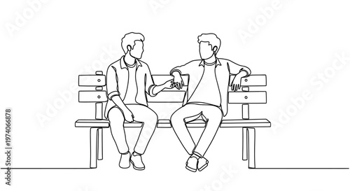 Two young men sitting together on a park bench having a conversation.