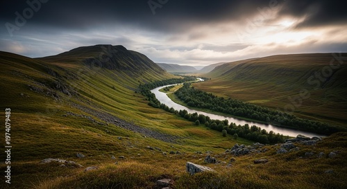 Scenic River Valley Landscape Under Dramatic Cloudy Sky.