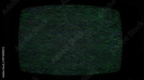 Static Noise on Old Television Screen with Green and Blue Hues.