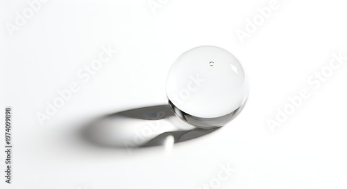 Sleek modern glass dome resting on a metallic stand against a plain background
